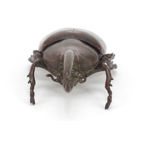 409 - Large Japanese patinated bronze Hercules beetle with articulated wings, 10cm in length