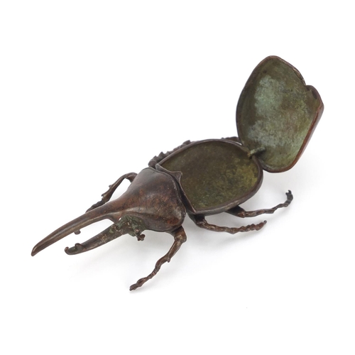 409 - Large Japanese patinated bronze Hercules beetle with articulated wings, 10cm in length