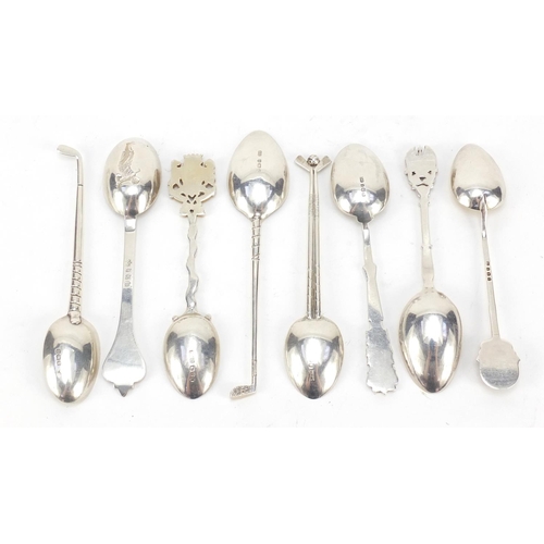 512 - Eight golfing interest silver teaspoons, various hallmarks, the largest 13.5cm in length, 168.2g