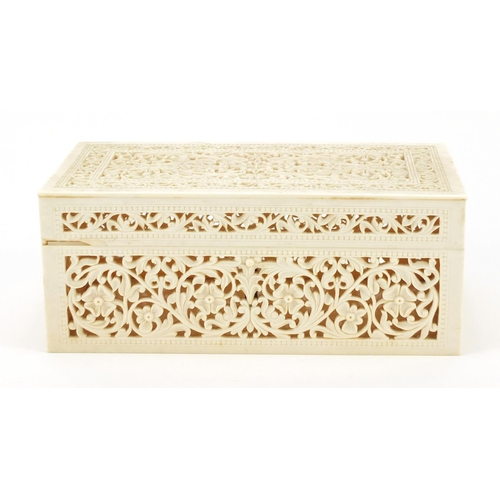 168 - Anglo Indian ivory casket finely and profusely carved and pierced with flower heads amongst foliage,... 