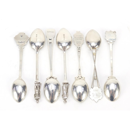 511 - Seven golfing interest silver teaspoons, some with enamelled terminals, various hallmarks, the large... 