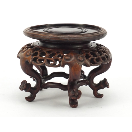 373 - Good Chinese hardwood stand finely carved with flower heads and possibly Zitan, 9cm high x 12.5cm in... 