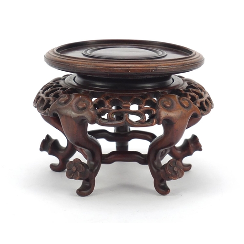 373 - Good Chinese hardwood stand finely carved with flower heads and possibly Zitan, 9cm high x 12.5cm in... 