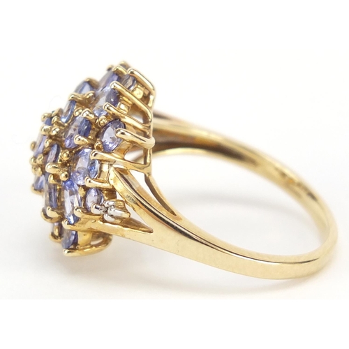 536 - 9ct gold purple stone cluster ring, possibly iolite, size Q, 4.6g