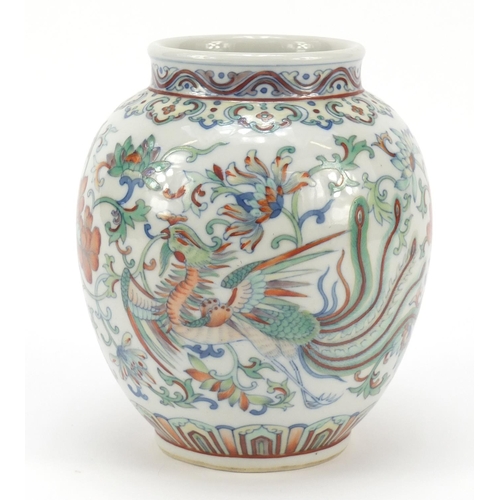 251 - Chinese doucai porcelain vase finely hand painted with a dragon and phoenix amongst flowers, six fig... 