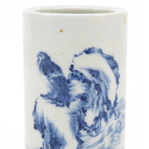 8 - Chinese blue and white porcelain brush pot, finely hand painted with an eagle on a rock amongst wave... 