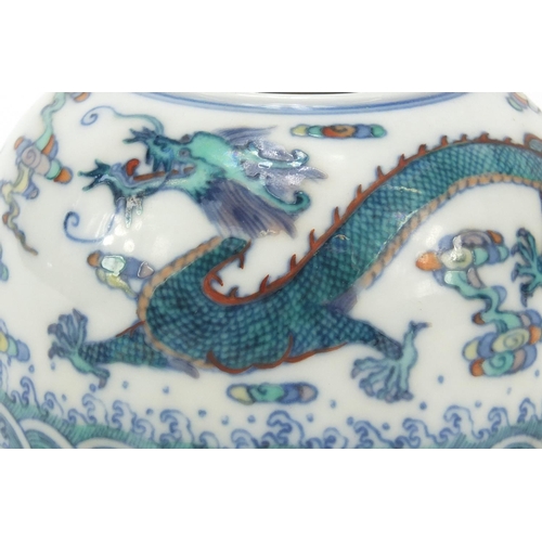 403 - Chinese doucai porcelain brush pot, hand painted with a dragon amongst clouds chasing a flaming pear... 