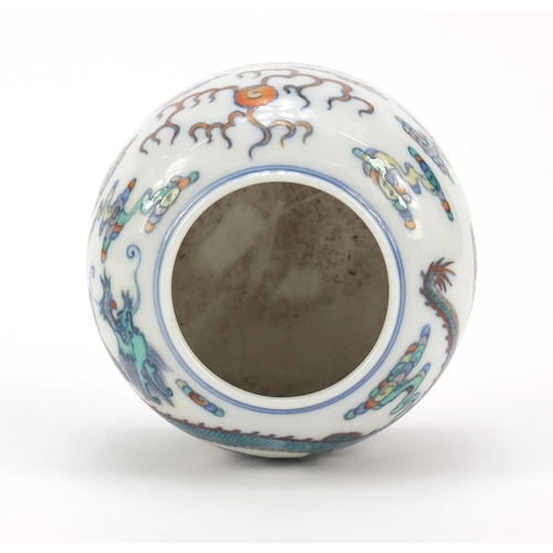 403 - Chinese doucai porcelain brush pot, hand painted with a dragon amongst clouds chasing a flaming pear... 