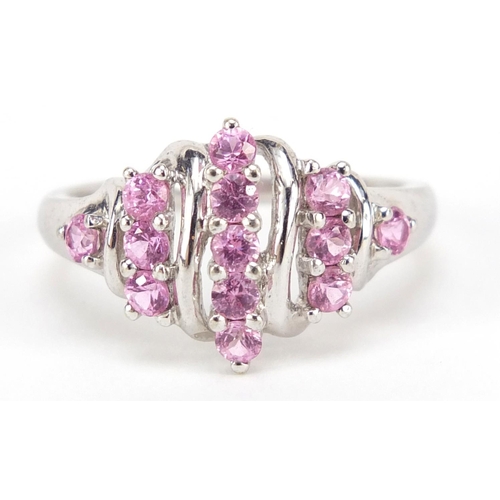 676 - 9ct white gold pink sapphire ring, size Q, 3.3g