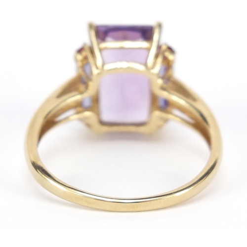 309 - 9ct gold amethyst and purple stone ring, size W, 4.5g