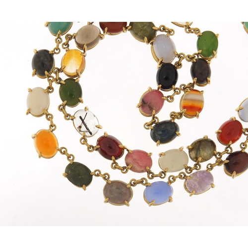 76 - Good 18ct gold necklace set with symmetrical cabochon semi precious stones, including opal, lapis la... 