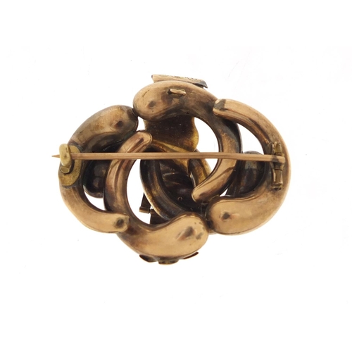 134 - Victorian unmarked gold belt buckle design brooch (tests as 9ct gold) 4cm wide, 8.8g