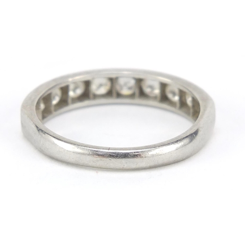 111 - Unmarked white gold and platinum diamond half eternity ring, size P, 4.2g