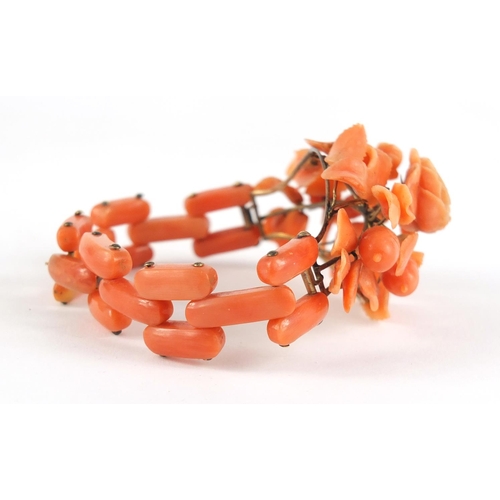 180 - Victorian carved pink coral floral bracelet, 17cm in length, 31.5g