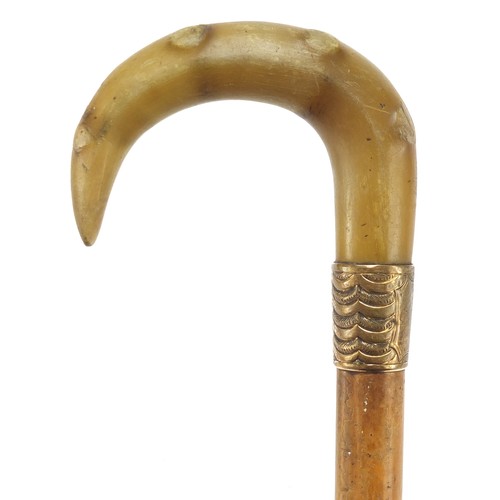 348 - Malacca walking stick with rhinoceros horn handle, 90cm in length