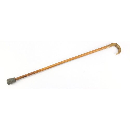 348 - Malacca walking stick with rhinoceros horn handle, 90cm in length