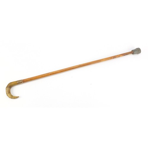 348 - Malacca walking stick with rhinoceros horn handle, 90cm in length