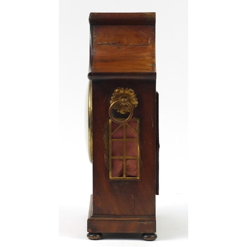 34 - Regency mahogany pagoda topped bracket clock with inset brass panel to the front, flower head design... 
