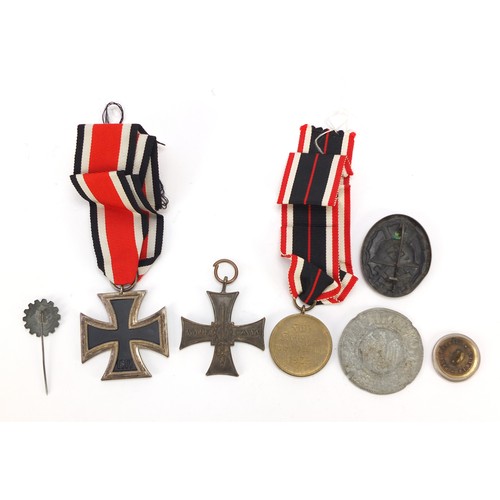 427 - German and Polish militaria including a Cross of Valor, Wounds badge, Iron Cross and 1939 War Merit