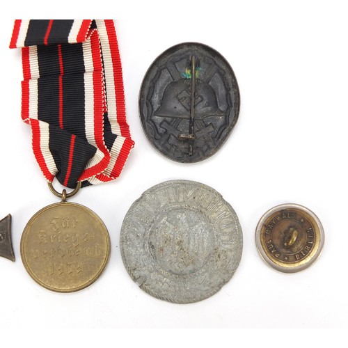 427 - German and Polish militaria including a Cross of Valor, Wounds badge, Iron Cross and 1939 War Merit