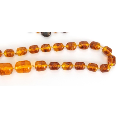 1548 - Amber coloured bead necklaces and loose beads, approximate weight 158.0g