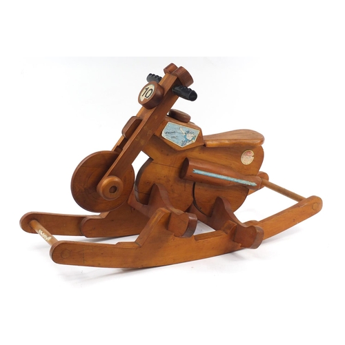 575 - Child's carved wood rocking motorcycle, 90cm in length