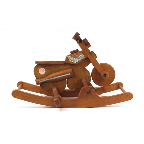 575 - Child's carved wood rocking motorcycle, 90cm in length