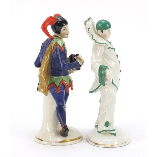 123 - Two Sitzendorf porcelain figures of a jester and a Pierrot by Siegel, each 23cm high