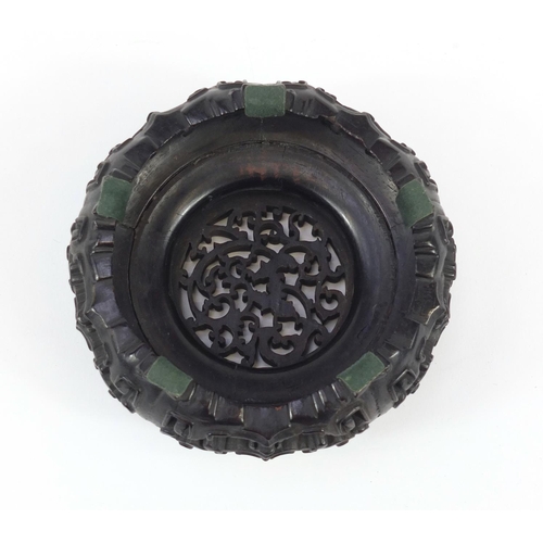 172 - Good Chinese carved hardwood stand carved and pierced with flowers, 12cm in diameter