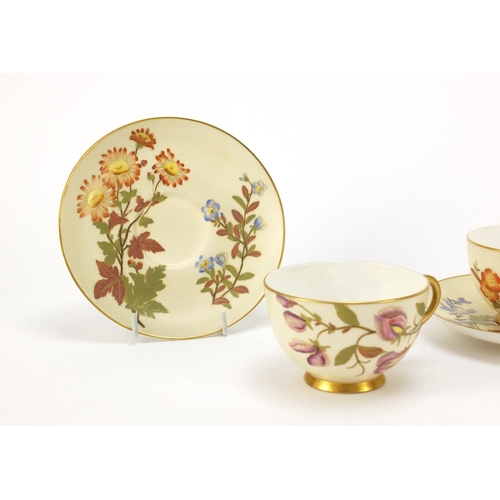 61 - Royal Worcester Blush Ivory comprising a jug numbered 1376 and two cups with saucers, each decorated... 