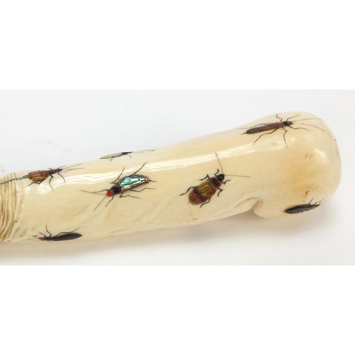 174 - Japanese Shibayama ivory phallus inlaid with insects carved with calligraphy, 16.5cm in length