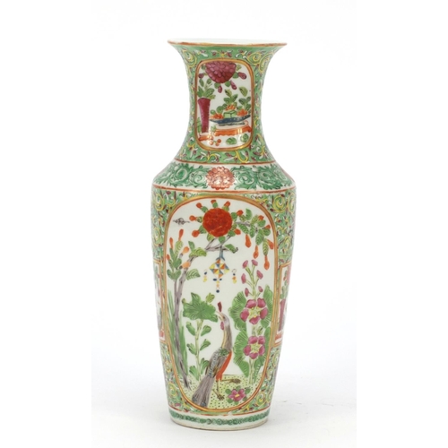 168 - Chinese porcelain vase hand painted in the famille rose palette with panels of birds amongst flowers... 