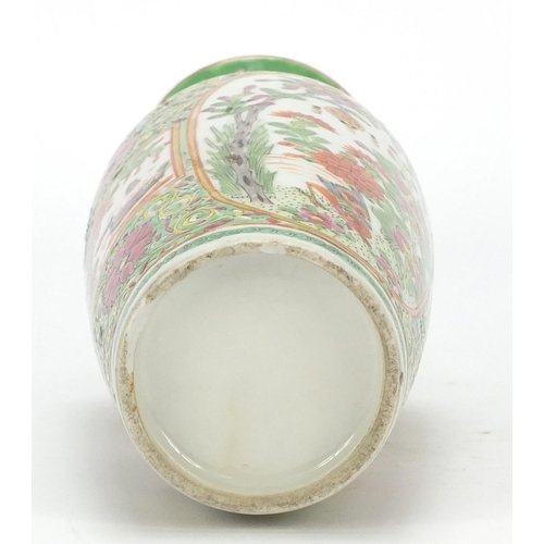 168 - Chinese porcelain vase hand painted in the famille rose palette with panels of birds amongst flowers... 