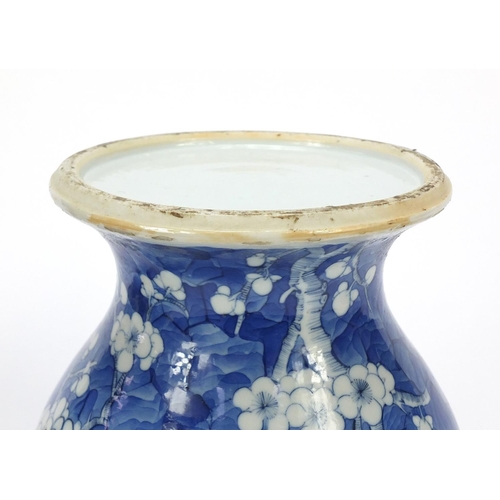 165 - Pair of Chinese blue and white porcelain baluster vases with covers, each hand painted with prunus f... 