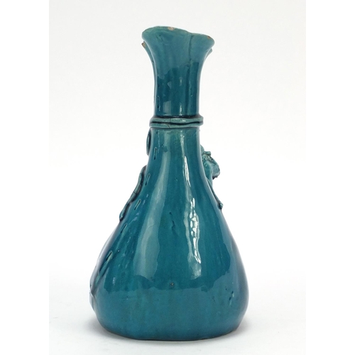 125 - Minton style turquoise glaze pottery vase in the form of a Chinese man with a sack, 25cm high