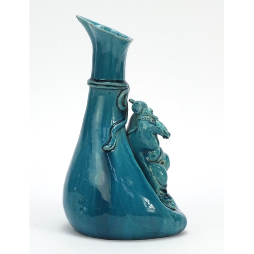 125 - Minton style turquoise glaze pottery vase in the form of a Chinese man with a sack, 25cm high