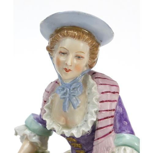 148 - Pair of German hand painted Dresden porcelain figures of a shepherd and shepherdess, 19cm high