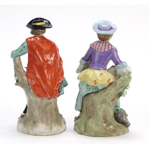 148 - Pair of German hand painted Dresden porcelain figures of a shepherd and shepherdess, 19cm high