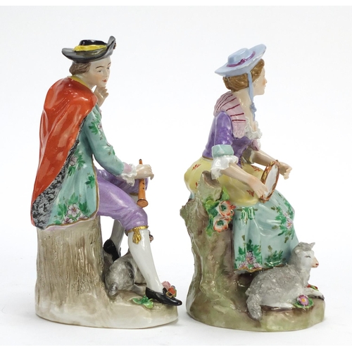 148 - Pair of German hand painted Dresden porcelain figures of a shepherd and shepherdess, 19cm high