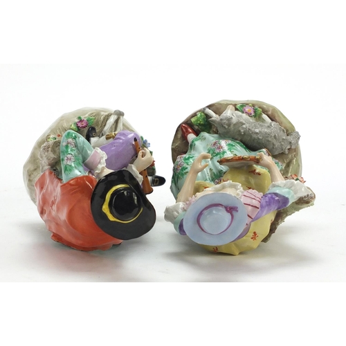 148 - Pair of German hand painted Dresden porcelain figures of a shepherd and shepherdess, 19cm high