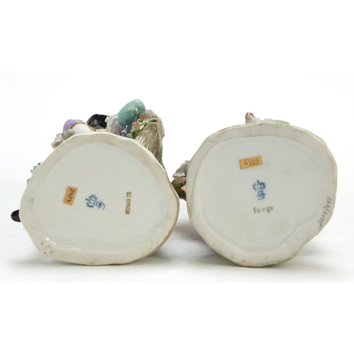 148 - Pair of German hand painted Dresden porcelain figures of a shepherd and shepherdess, 19cm high