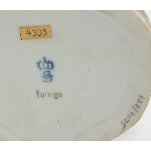 148 - Pair of German hand painted Dresden porcelain figures of a shepherd and shepherdess, 19cm high