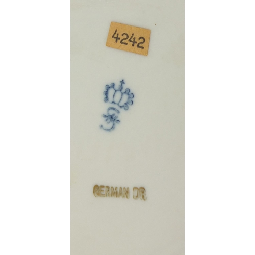 148 - Pair of German hand painted Dresden porcelain figures of a shepherd and shepherdess, 19cm high