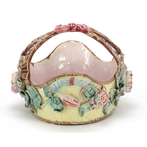 145 - Victorian Majolica pottery basket decorated in relief with flowers, 29cm wide