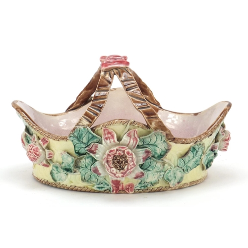 145 - Victorian Majolica pottery basket decorated in relief with flowers, 29cm wide