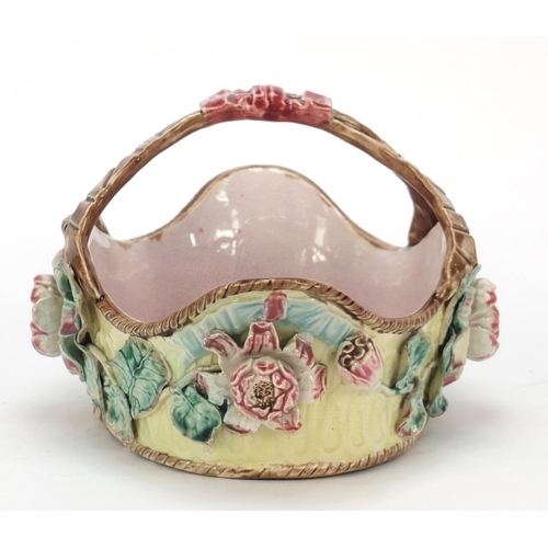 145 - Victorian Majolica pottery basket decorated in relief with flowers, 29cm wide