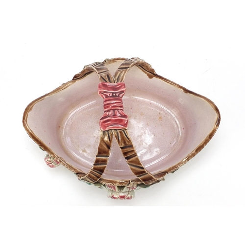 145 - Victorian Majolica pottery basket decorated in relief with flowers, 29cm wide