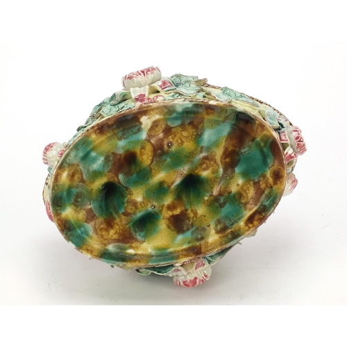 145 - Victorian Majolica pottery basket decorated in relief with flowers, 29cm wide