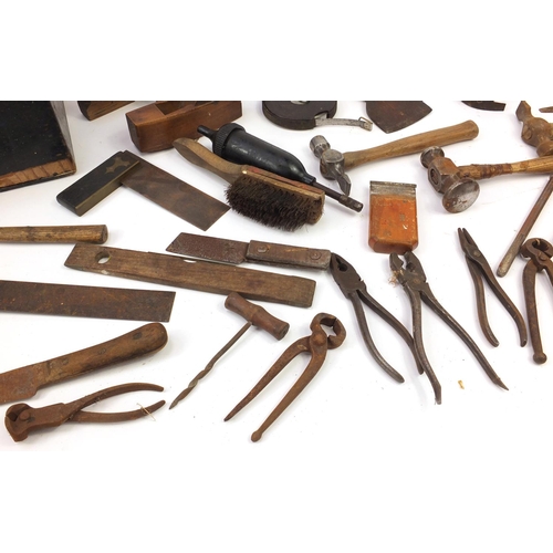 2484 - Vintage and later wood working tools housed in a stained pine chest, including smoothing planes and ... 