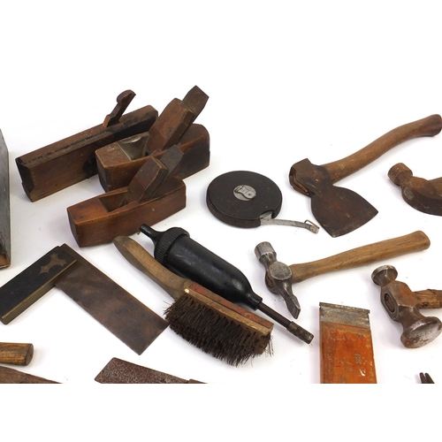 2484 - Vintage and later wood working tools housed in a stained pine chest, including smoothing planes and ... 